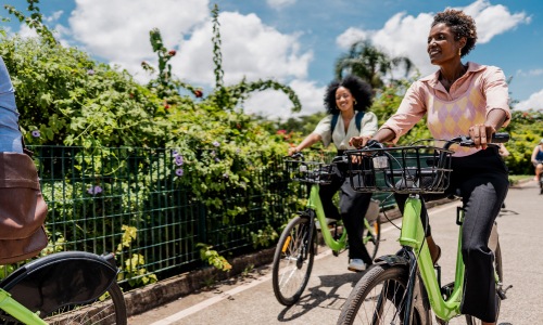 The essence of exceptional living friends on a bike