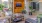 a living room with a tv and furniture