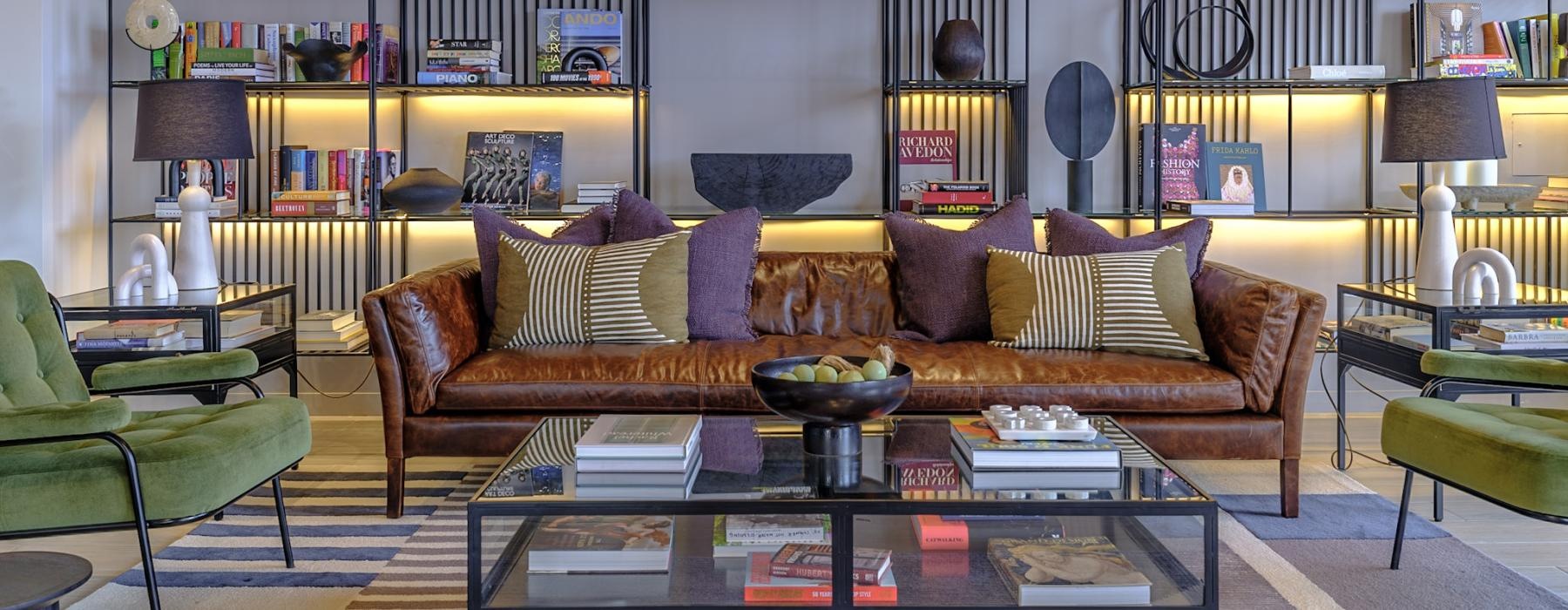 a living room with a large glass wall