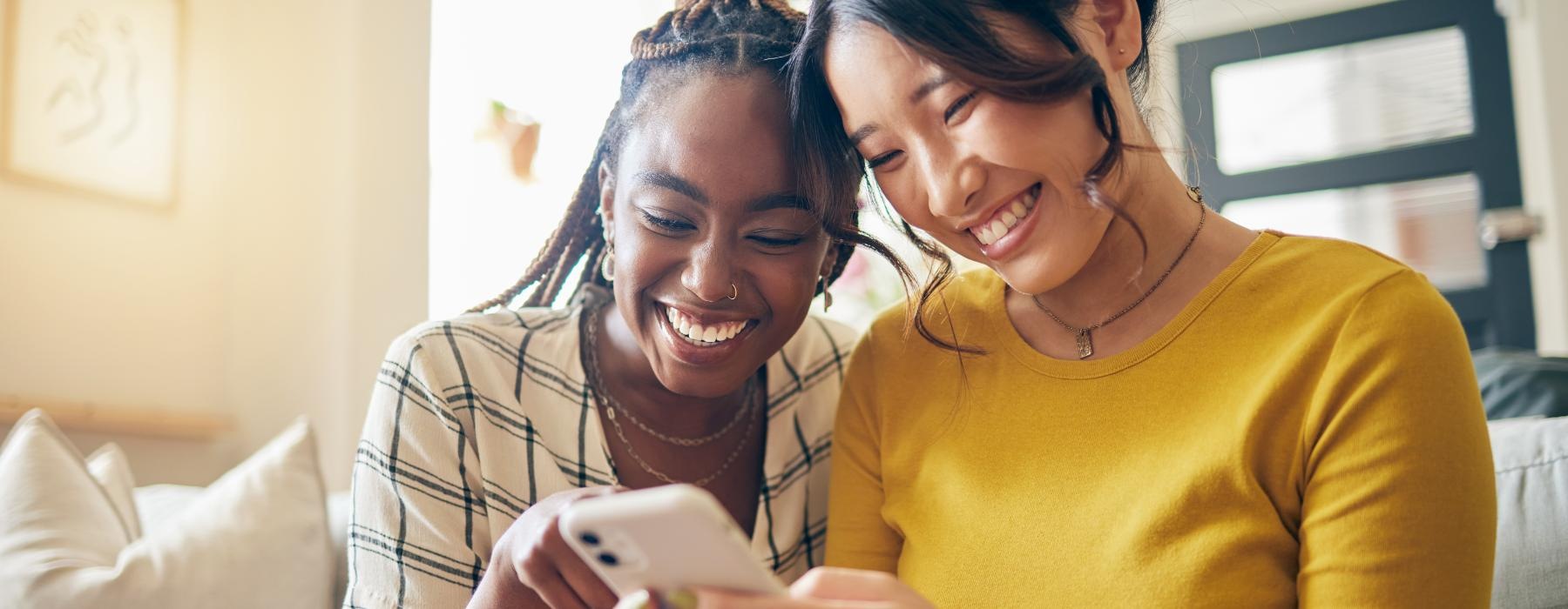 a couple of women smiling