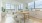 a kitchen with a table and chairs