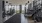a room with treadmills and large windows